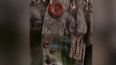Paul Sunga and Nicky Chan A close up of one of her designs showing different buttons and fabrics.