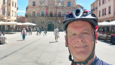 Steve Howe in a cycling helmet 