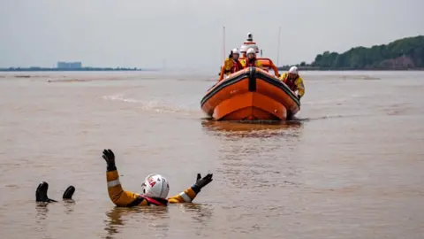 SARA Training on the River Severn with a lifeboat crew being called to someone struggling in the water