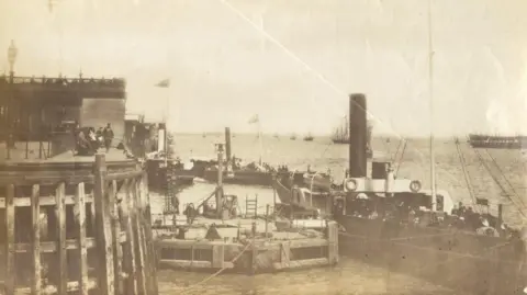 Hull City Council Archive black and white photograph showing a paddle steamer by Victoria Pier in the 19th Century