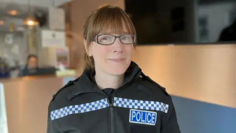 Female police officer in uniform