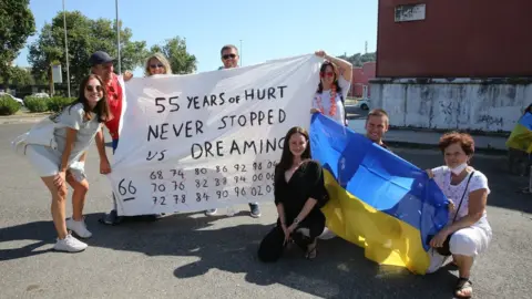 PA Media Fans in Rome ahead of England v Ukraine during the UEFA Euro 2020 Quarter Final match taking place at the Stadio Olimpico, Rome. Picture date: Saturday July 3, 2021. PA Photo. See PA story SPORT England. Photo credit should read: Marco Iacobucci/PA Wire. RESTRICTIONS: Use subject to restrictions