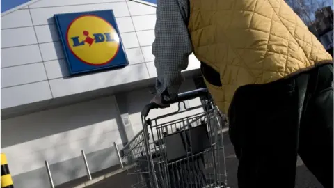 Getty Images A shopper at Aldi