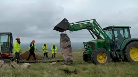 Dartmoor National Park Authority Dartmoor standing stone righted