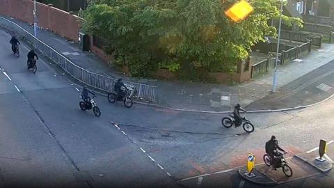 Bikes being ridden dangerously along the road in Kirkby