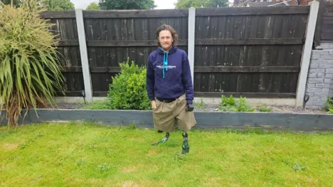 Hayley Coyle/BBC Craig Wood in his garden 