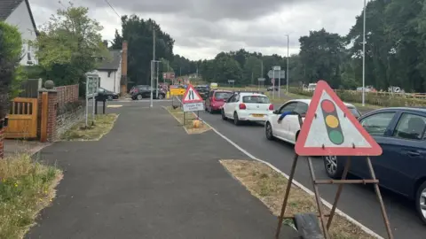 Traffic waiting by the Clophill roundabout roadworks