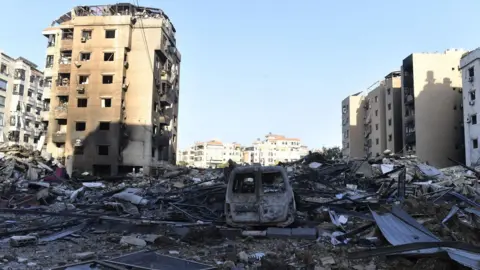 Getty Images Damaged buildings in a residential area following an Israeli attack in the Dahieh neighborhood of Beirut