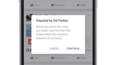 Facebook Screengrab of "Disputed by 3rd parties" pop-up message