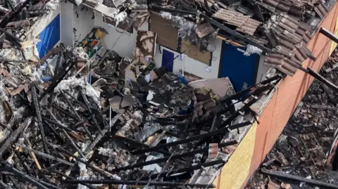 Wreckage of a building.
