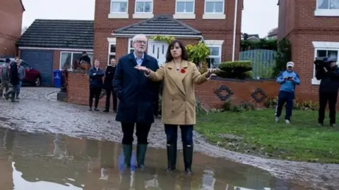 EPA Jeremy Corbyn and Caroline Flint