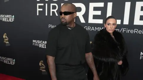 Getty Images Kanye West and his wife, model Bianca Censori at the Grammys