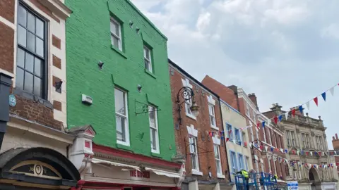 One of the five buildings included in the 'Glow Up' project