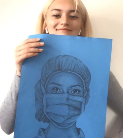 Jessica Wilcox-Drew Jessica with her picture