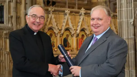 Paul Garrett and the Very Rev Dr John Hall, chair of the RSCM