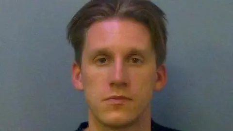 Thames Valley Police Jacob Leland looks at the camera in a police mugshot. 
