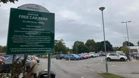 A sign for a free car park in Cheshire East