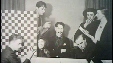 The cast of The Man with a Flower in his Mouth preparing to film.