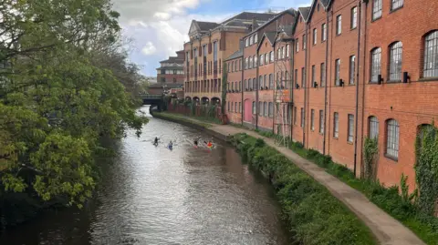 BBC/Julia Gregory Kayakers on the river Wey in Guildford