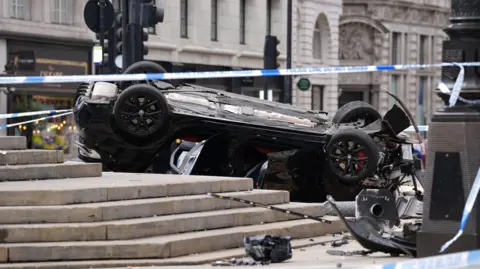 PA Media A black car crashed in Piccadilly Circus