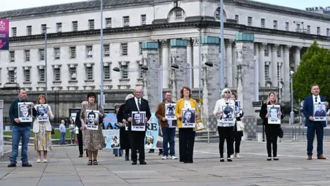 Families arrive at the Waterfront in Belfast on Tuesday. The coroner, Mrs Justice Keegan, presented her findings at the Nightingale Court facility in Belfast's Waterfront Hall, into the deaths of 10 people in the wake of an Army operation almost 50 years ago.