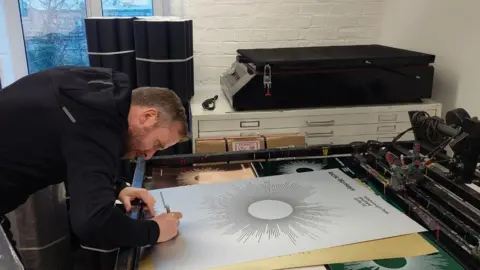 Friends of Meersbrook Bank School Alex Szabo-Haslam with Arctic Monkeys posters