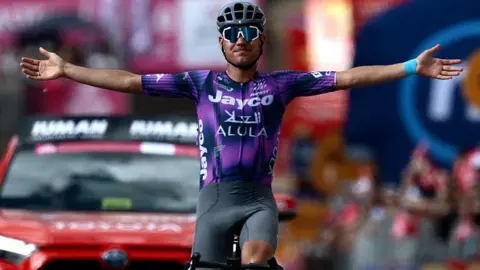 Luke Plapp celebrates winning stage eight of the Giro d'Italia