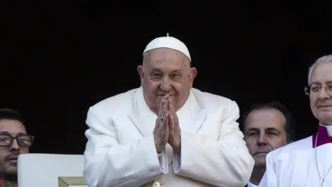 shutterstock Pope Francis leads the traditional Urbi et Orbi Christmas Day blessing from the central balcony of Saint Peter's Square at the Vatican City, 25 December 2024.