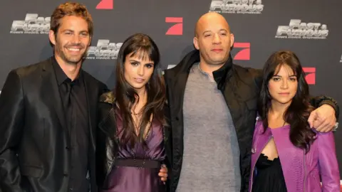 Getty Images Paul Walker, Jordana Brewster, Vin Diesel and Michelle Rodriguez promoting Fast & Furious in Germany