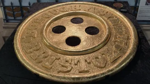 BBC A view from above of the giant 1m chocolate button wrapped in golden foil