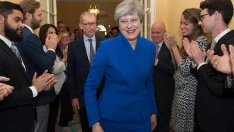 AFP Theresa May in Downing Street