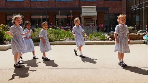 Getty Images Girls play game
