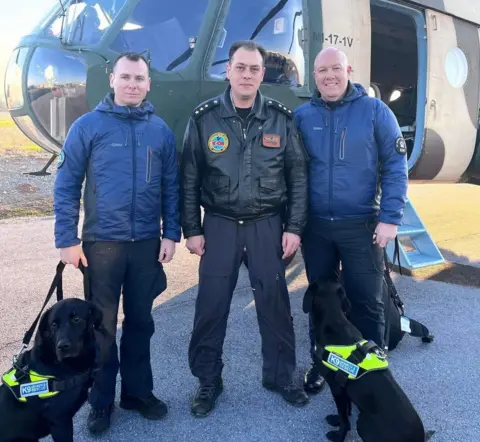 K9 Search & Rescue NI Ryan Gray (left) and Kyle Murray (right) and their dogs Max and Delta flew to the Turkish earthquake zone on Friday