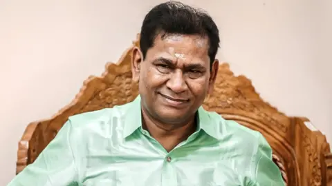 BBC Santiago Martin, an Indian businessman, poses for a photograph at an event in Coimbatore, India, June 30, 2021.