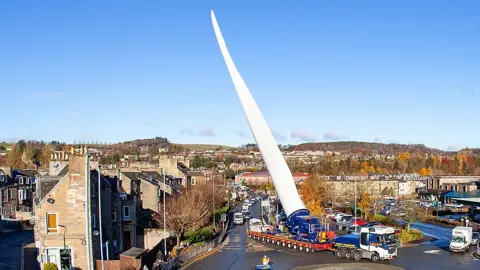 Dougie Johnston A giant turbine on the back of a lorry makes its way through the centre of Hawick