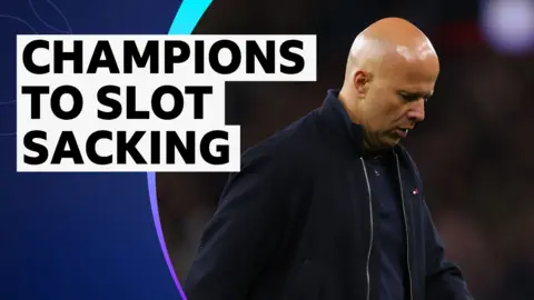 Liverpool manager Arne Slot looks downwards 