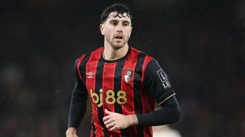 Marcos Senesi running while playing for Bournemouth
