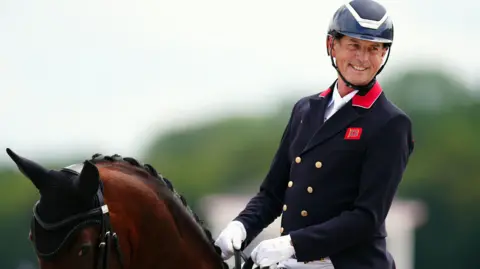 Carl Hester rides at the 2024 Olympic Games in Paris
