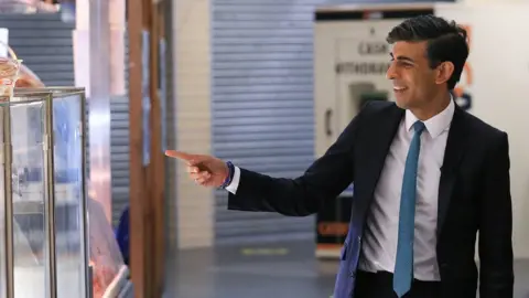 PA Media Rishi Sunak on a visit to Bury Market