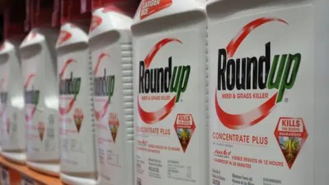 Getty Images Bottles of Monsanto's Roundup are seen for sale June 19, 2018 at a retail store in Glendale, California