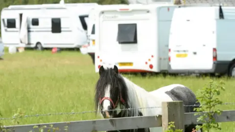 Barcroft Media/Getty caravans illegally camp on private land