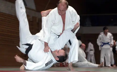 AFP Vladimir Putin in a judo bout in 2009