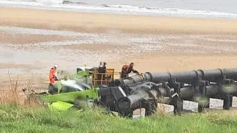 Stevie Wilson Big pipe being dismantled 