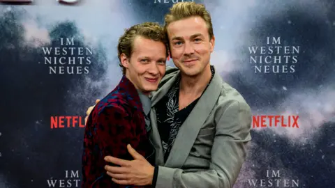 Getty Images Austrian actor Felix Kammerer (left) and German actor Albrecht Schuch at the premiere of All Quiet On The Western Front