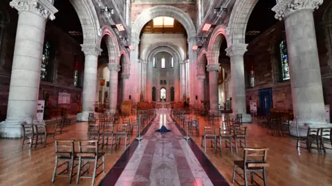 PAcemaker St Anne's Cathedral, Church of Ireland, prepares to open for Good Friday service