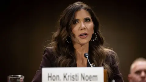 Kristi Noem speaks at a hearing. 