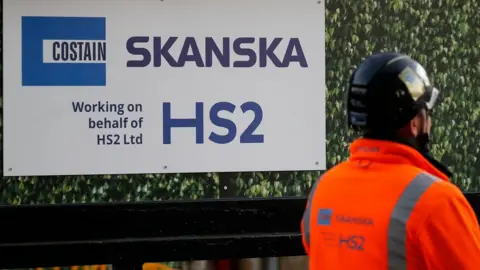 AFP HS2/Skanska sign and worker