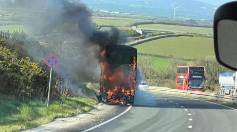 Bus on fire on A30 near Bodmin