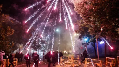 EPA Protesters throw fireworks at riot police in Nanterre, 29 June 2023