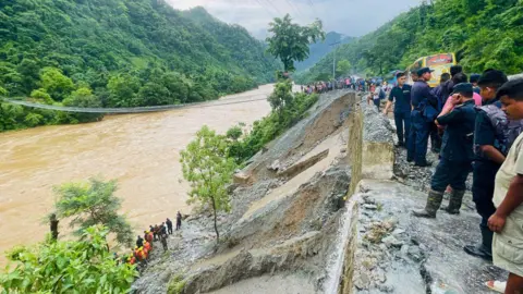 Rescuers search for survivors in river Trishuli